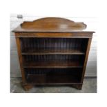 A low level oak bookcase, 40.5in high x 36.25in wi