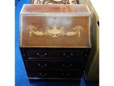 A c.1900 mahogany bureau with inlaid decor, 22in w