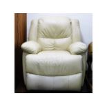 A leather electric recliner chair in cream