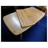 A retro Ercol extending dining table with two leav