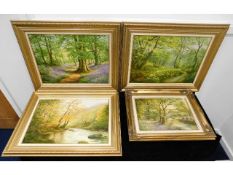 Four gilt framed original decorative landscape oil