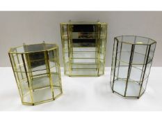 Three small glass display cabinets, largest 14in h