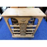 A decorative pine sixteen bottle wine rack, 32.5in