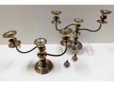 A pair of silver plated candelabra 13.5in wide x 1