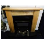 A modern fire surround & hearth with built in elec