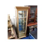 A pine display cabinet with mirrored back & glass