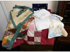 Two patchwork double bedspreads, one sewn by Canon