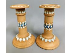 A pair of early 20thC. Doulton stoneware candle ho