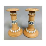 A pair of early 20thC. Doulton stoneware candle ho