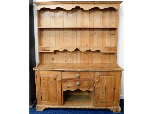 A pine farmhouse dresser with two drawers & cupboa