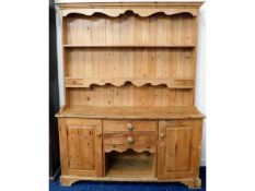 A pine farmhouse dresser with two drawers & cupboa