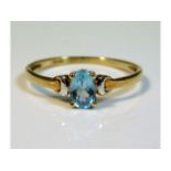 A 9ct gold topaz ring, size M/N 0.9g