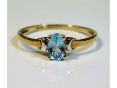 A 9ct gold topaz ring, size M/N 0.9g