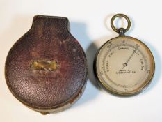 A brass cased pocket barometer by Ross Ltd. 31 Coc