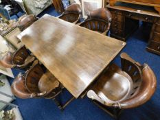 A substantial Canadian oak trestle table with six