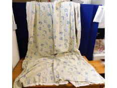 A pair of cream floral curtains, originally purcha