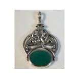 A Celtic style silver fob pendant with red & green