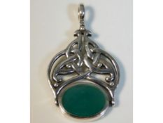 A Celtic style silver fob pendant with red & green