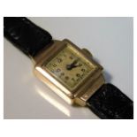 A ladies 9ct gold cased art deco wrist watch