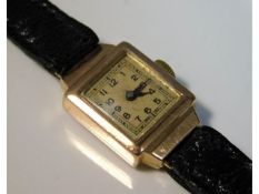 A ladies 9ct gold cased art deco wrist watch