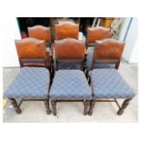 A set of six oak & leather chairs including one ca