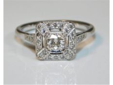 A palladium diamond ring set with centre old cut d