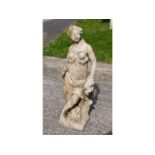 A reconstituted stone garden figure, 47in high