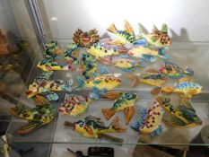 A quantity of mixed earthenware pottery fish