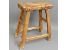 An 18th/19thC. rustic farm house stool, possibly elm & walnut/fruitwood 19in high