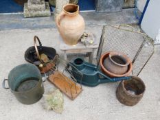 A copper two handled pot, a mid 20thC. paper rack,