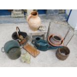 A copper two handled pot, a mid 20thC. paper rack,