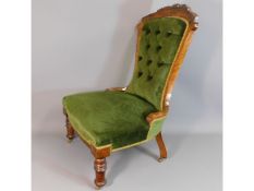 A c.1900 walnut upholstered nursing chair, 36.5in