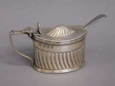 An 1892 London silver mustard by Haseler Bros. wit