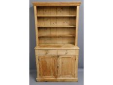 A small antique pine farmhouse dresser with four s