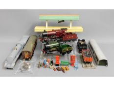 An O Gauge toy steam engine, rolling stock & other