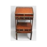 An early 19thC. three piece mahogany desk set, som