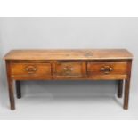 An 18thC. Georgian oak dresser base, 67in long x 3