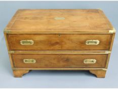 A brass bound campaign style chest of two drawers