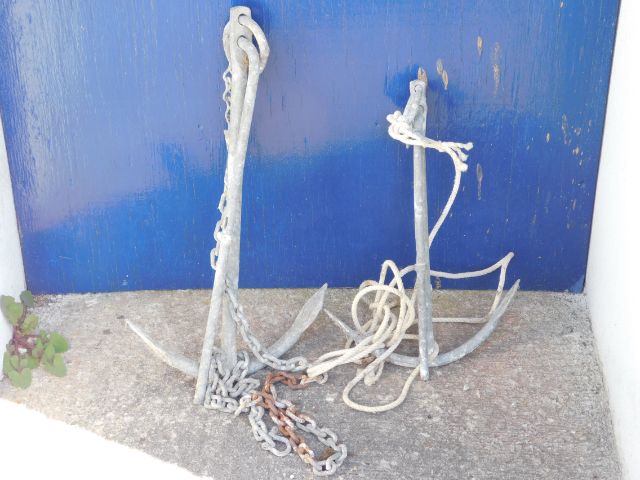 Two galvanised boat anchors, 22in & 18in high resp