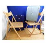 Two folding beech cane chairs twinned with Delsey