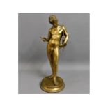 A 19thC. gilded bronze figure depicting Narcissus