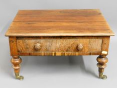 A 19thC. rosewood low level table with drawer, 20i