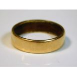 An 18ct gold band, size L, 3.5g