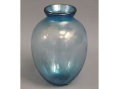 An iridescent glass vase, indistinctly signed to u