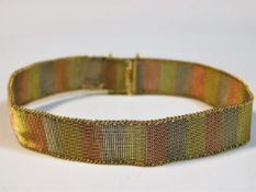 A 9ct three colour gold mesh bracelet 12.7g