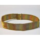 A 9ct three colour gold mesh bracelet 12.7g