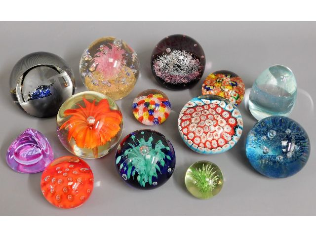 A quantity of mixed paperweights including five Ca