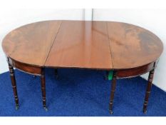 A 19thC. D-End extending mahogany dining table, 63