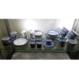 A quantity of mixed blue & white tea wares includi