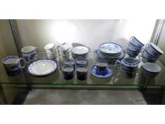 A quantity of mixed blue & white tea wares includi